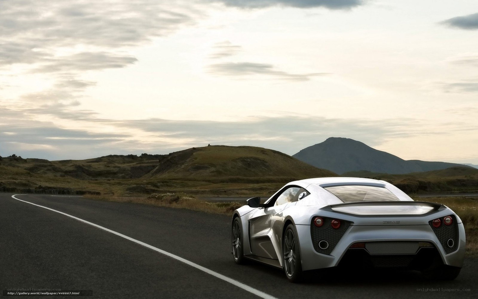 Silver sports car on a road
