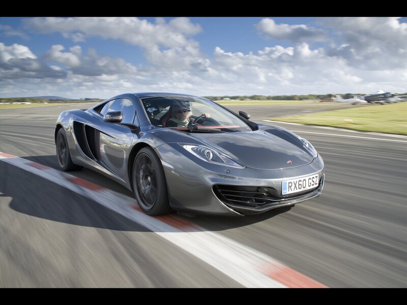 Silver sports car on a runway