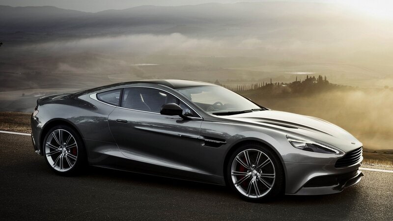 silver sports car on a scenic road