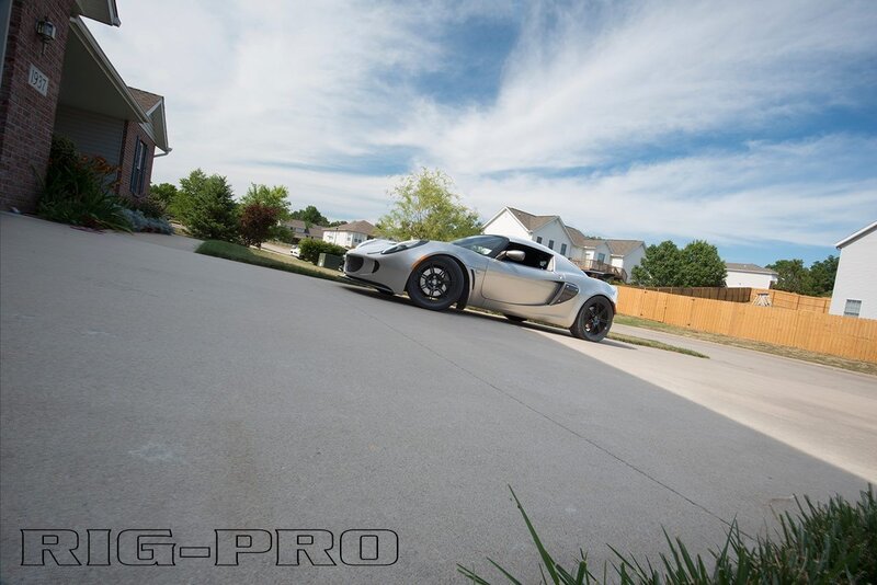 Silver sports car on a suburban street