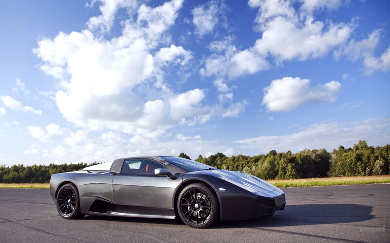 Silver sports car on a track