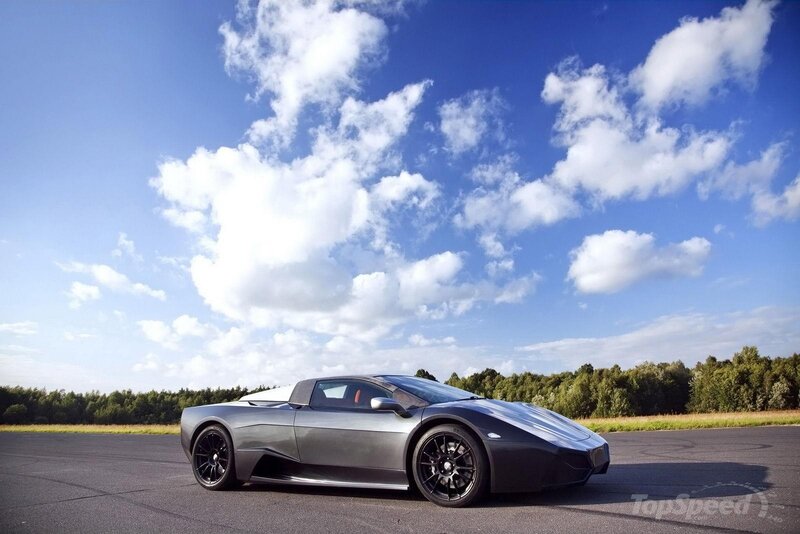 Silver sports car on a track