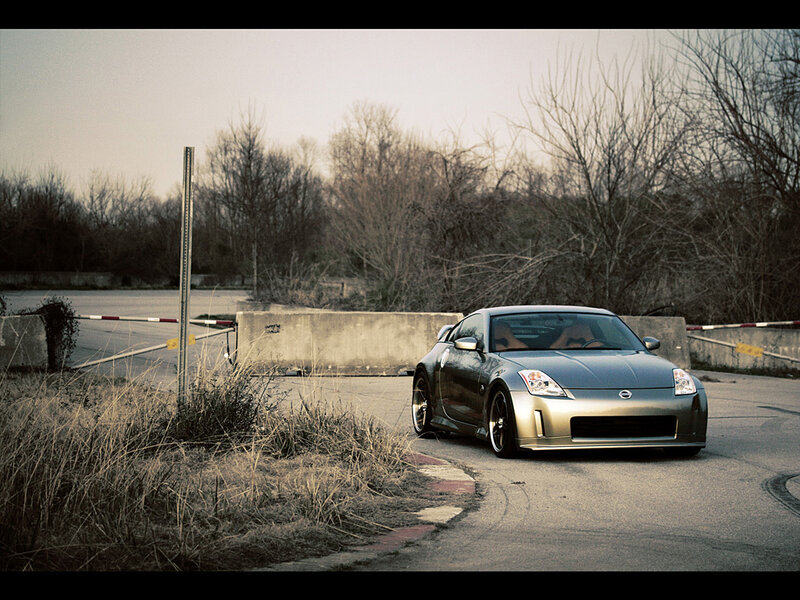 silver sports car on a track