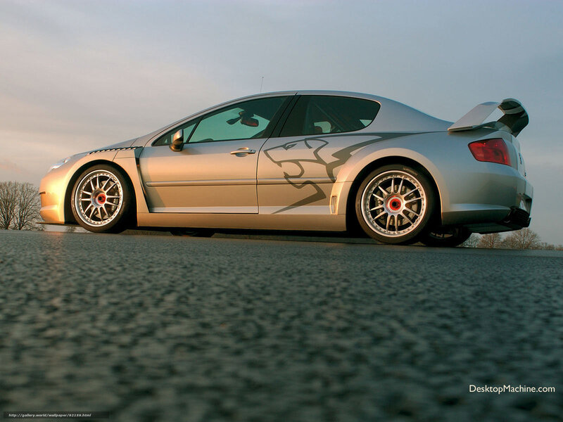 silver sports car on asphalt