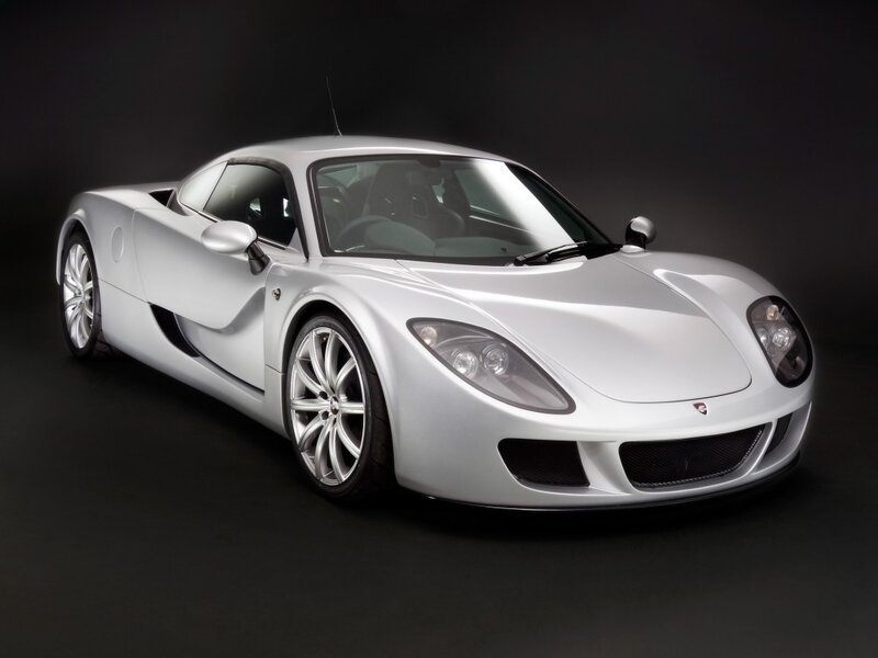 silver sports car on black