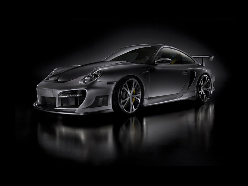 silver sports car on black background