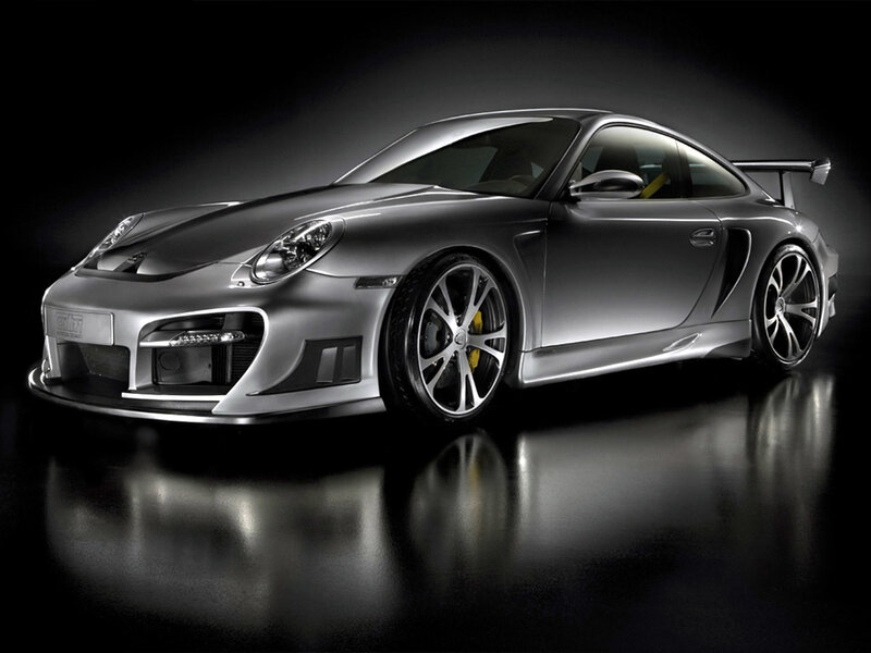 silver sports car on black background