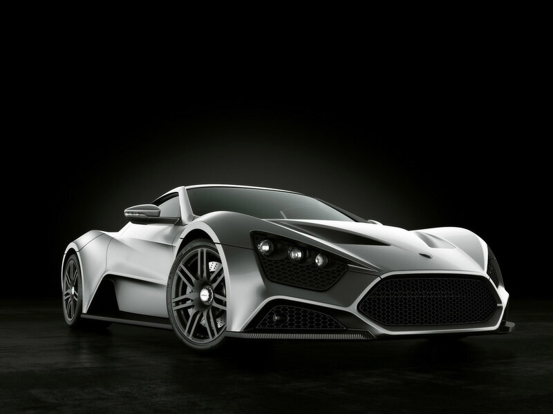 silver sports car on black background