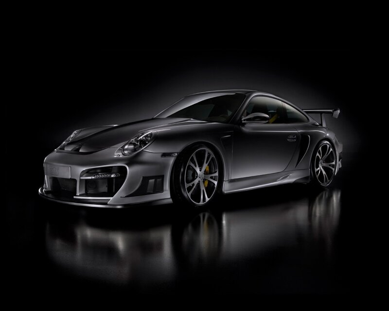silver sports car on black background