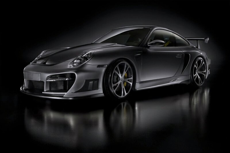 silver sports car on black background