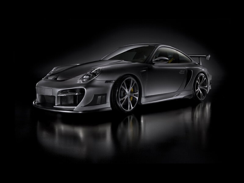 silver sports car on black background
