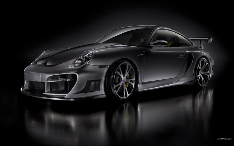 silver sports car on black background