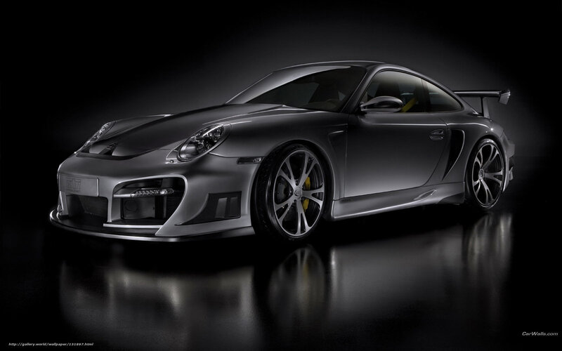 silver sports car on black background
