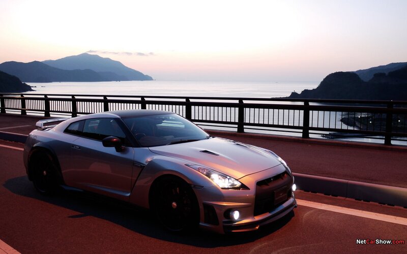 silver sports car on bridge