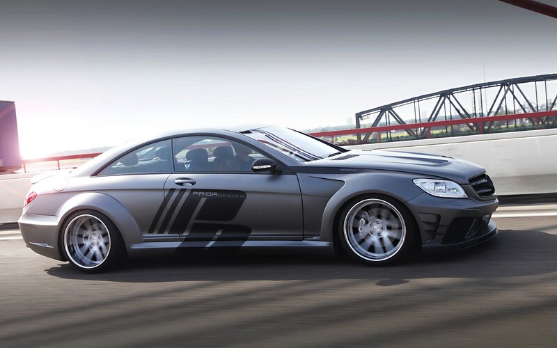 silver sports car on bridge