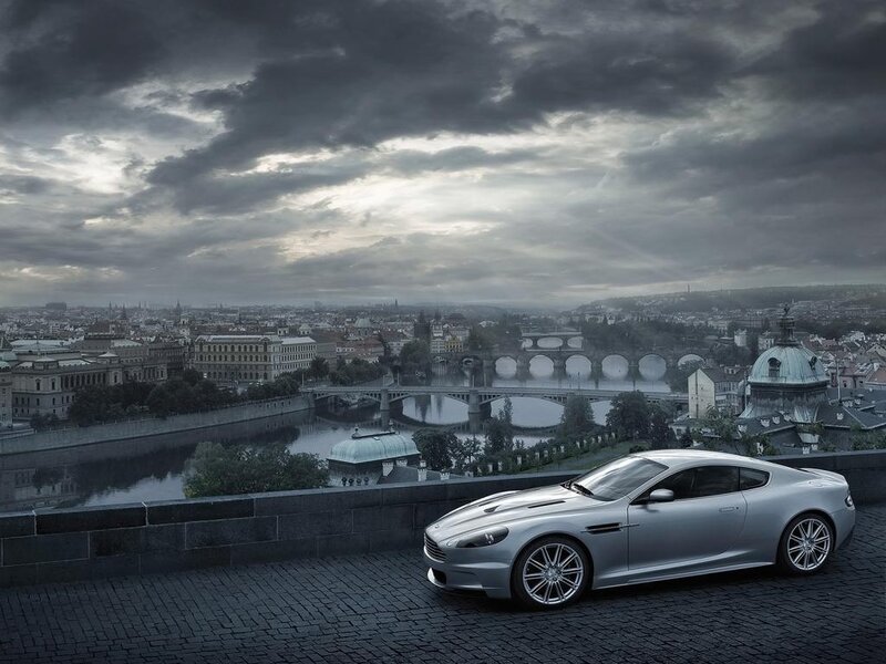 Silver sports car on city overlook