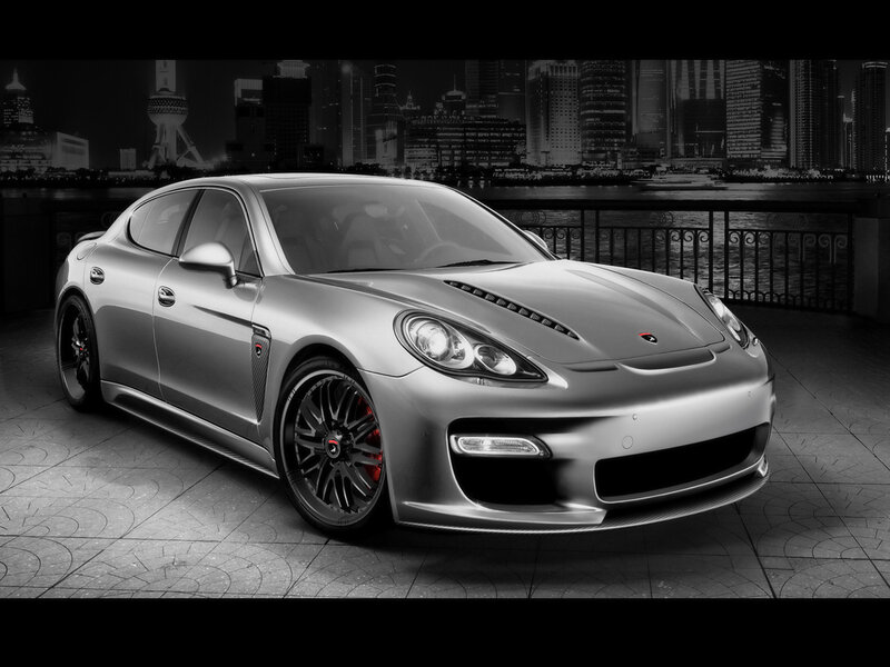 silver sports car on city street