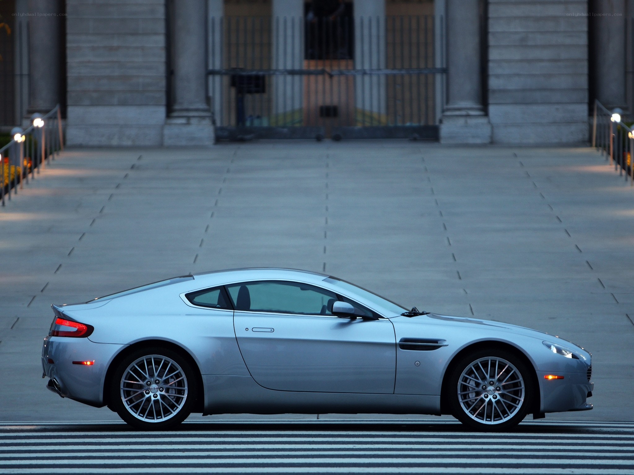 Silver sports car on city street