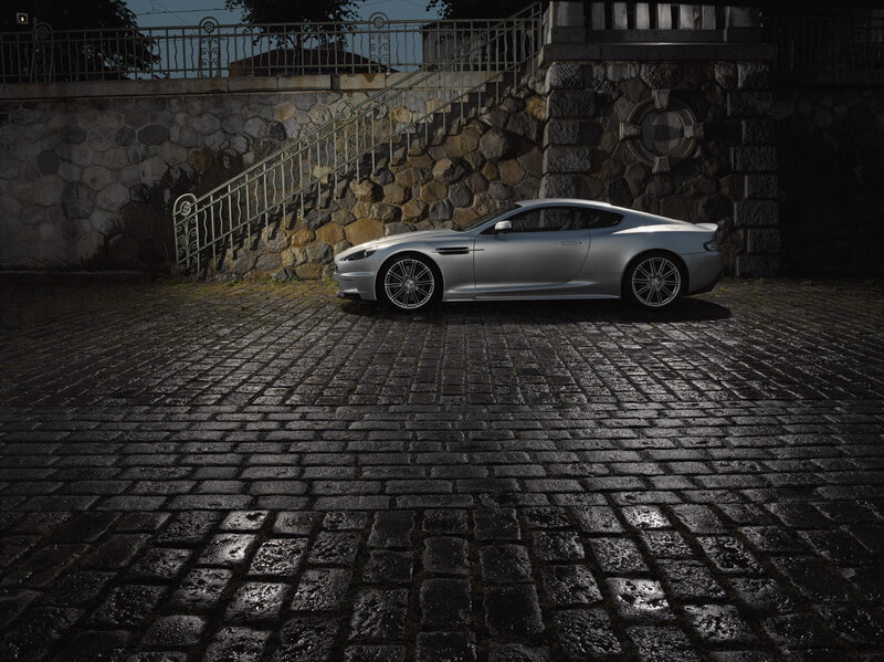 Silver sports car on cobblestones