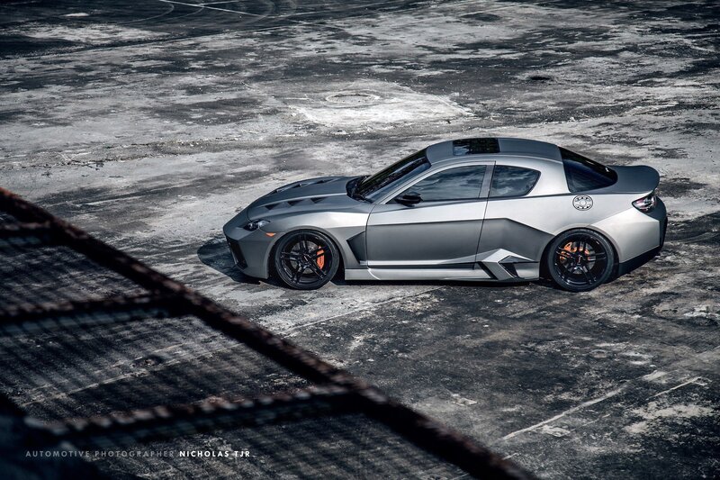 silver sports car on concrete