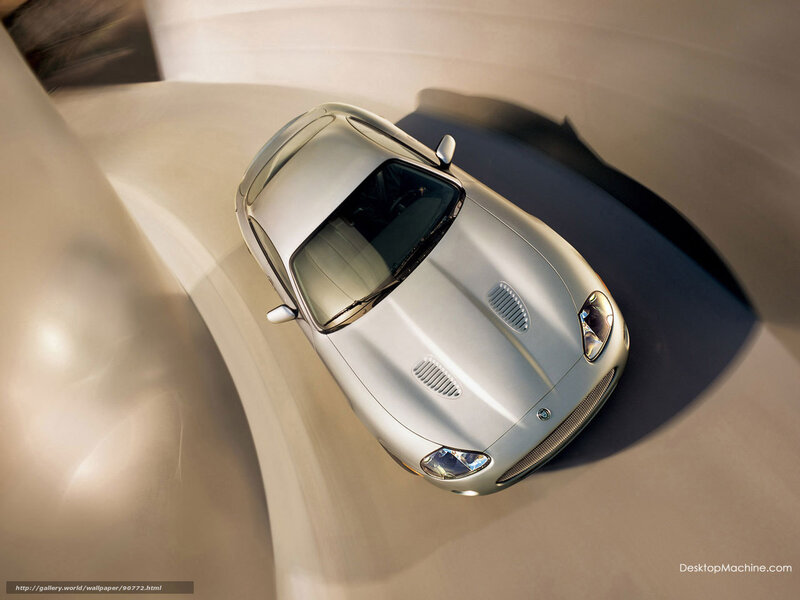 Silver sports car on curved track
