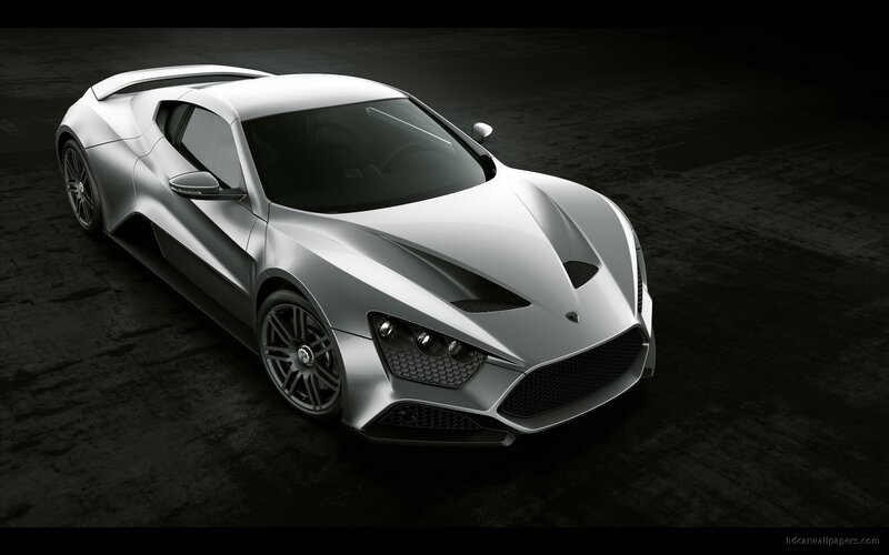 silver sports car on dark background