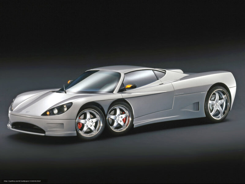 Silver sports car on dark background
