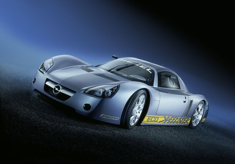 silver sports car on dark road