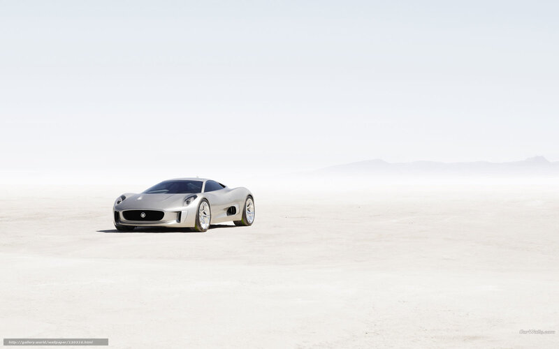 Silver sports car on desert plain