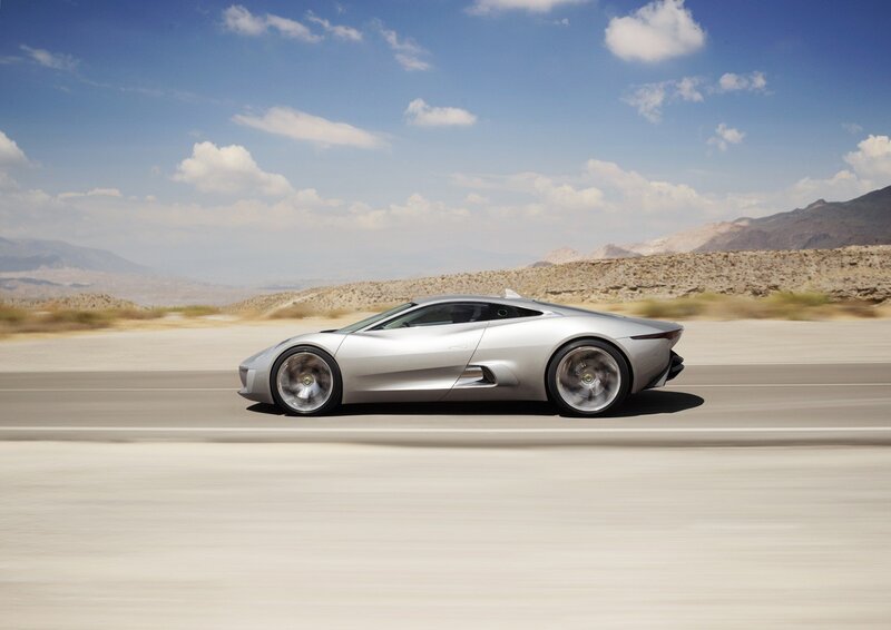 Silver sports car on desert road