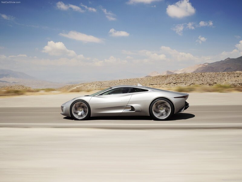 Silver sports car on desert road