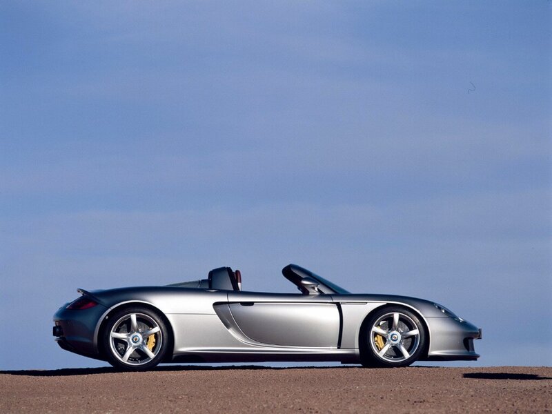 silver sports car on desert road