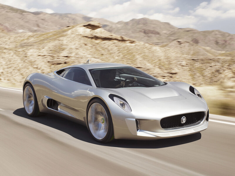 Silver sports car on desert road