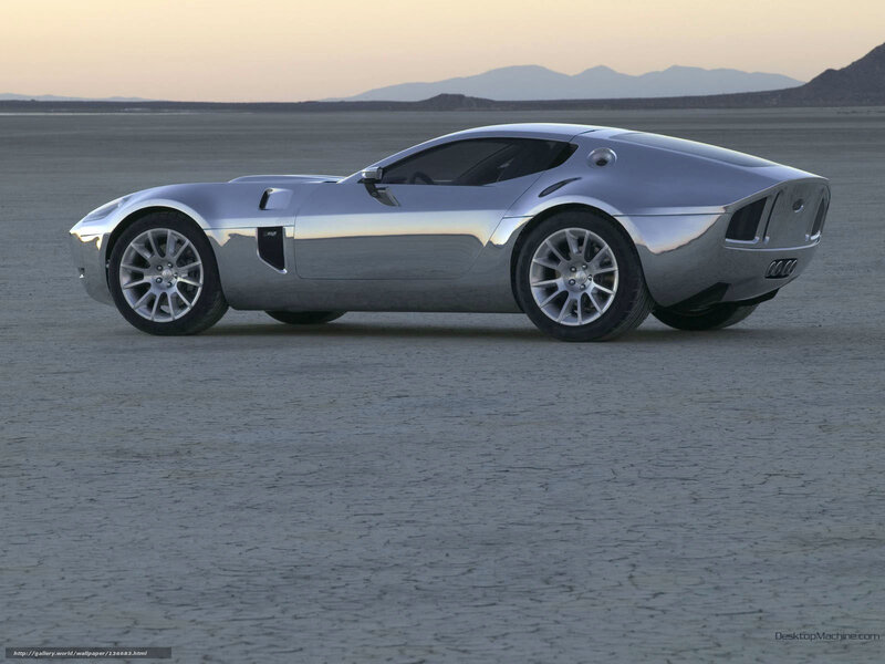 silver sports car on desert