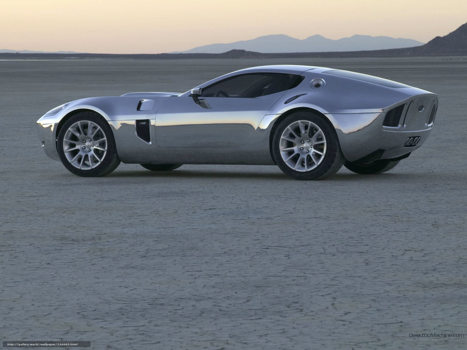 silver sports car on desert