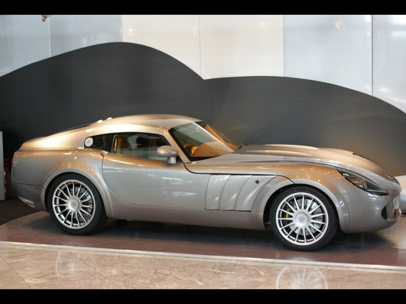 silver sports car on display