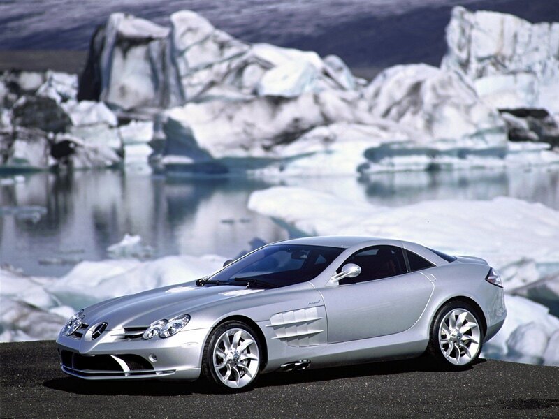 Silver sports car on glacier