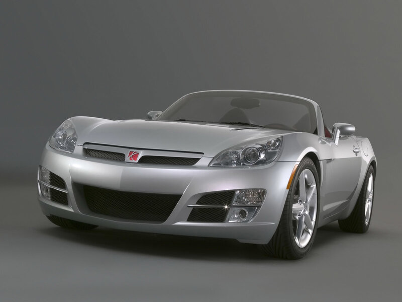 Silver sports car on gray background