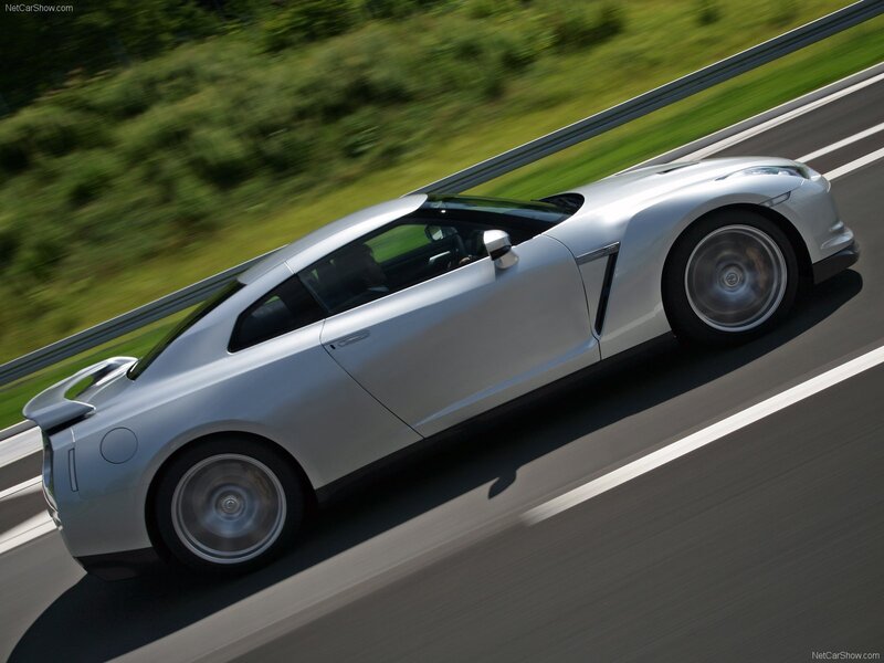 silver sports car on highway