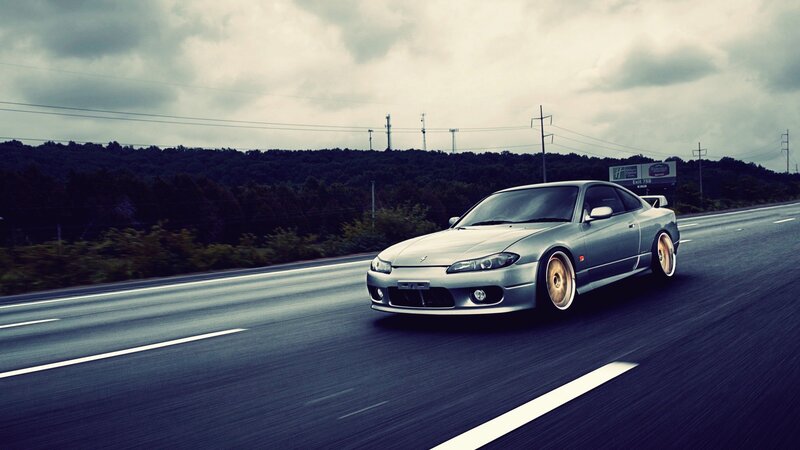 silver sports car on highway