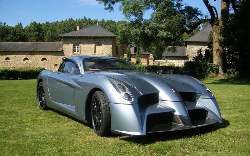 silver sports car on lawn