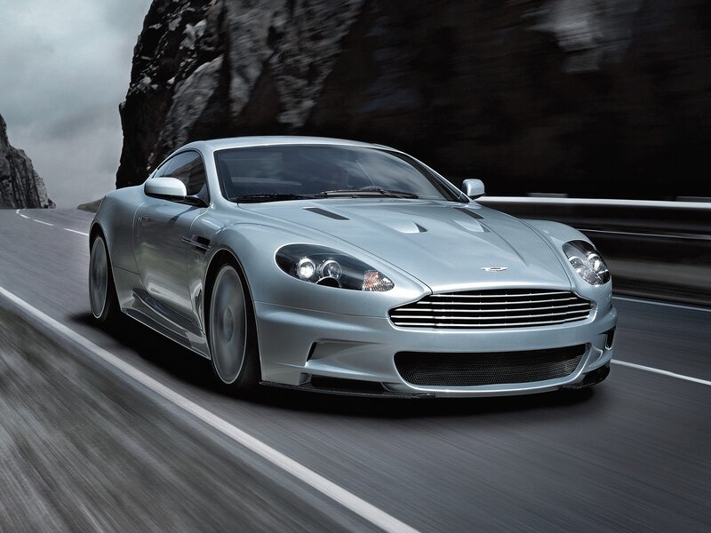 silver sports car on mountain road