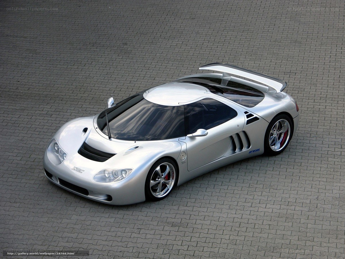 silver sports car on pavement