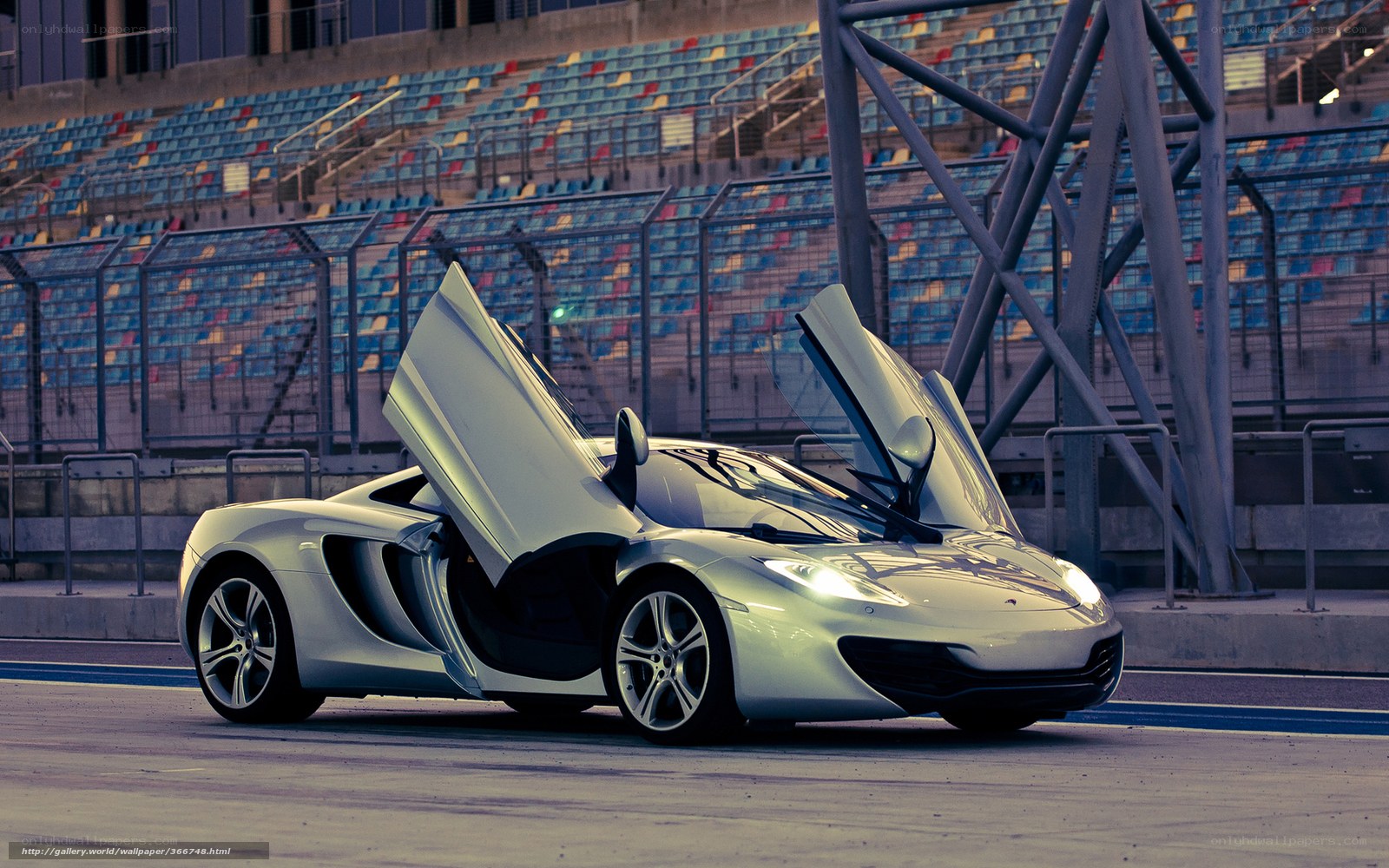 Silver sports car on racetrack