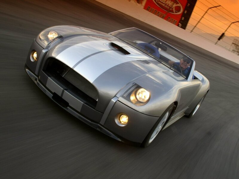 silver sports car on racetrack