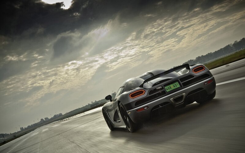 silver sports car on racetrack