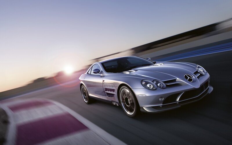 Silver sports car on racetrack