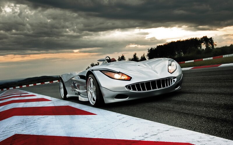 Silver sports car on racetrack