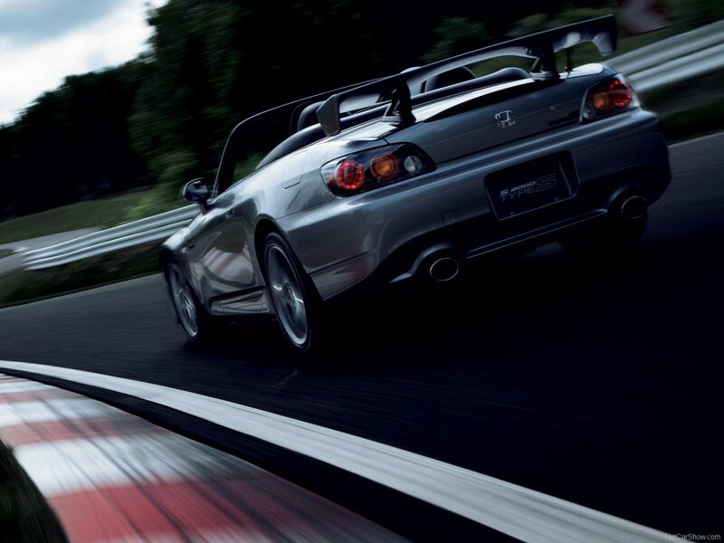 silver sports car on racetrack