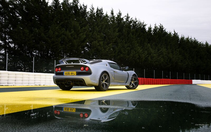Silver sports car on racetrack